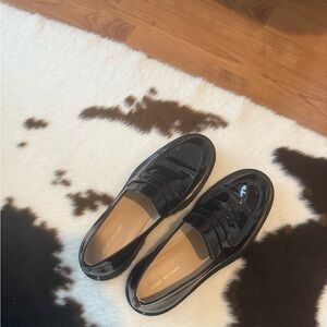 Stuart Weitzman Glossy Black Women's Slip-Ons